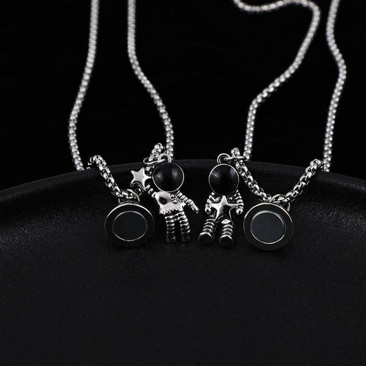Cosmic Bond β Dual Astronaut Pendant Set