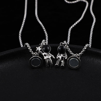 Cosmic Bond – Dual Astronaut Pendant Set