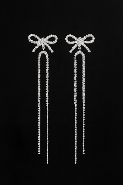 Twinkle Tails – Silver Bow Chain Earrings